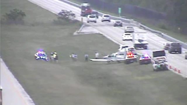 Pilot makes emergency landing on I-75