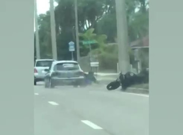 Auto rams motorcyclist in suspected road rage incident in Florida Auto rams motorcyclist in suspected road rage incident in Florida